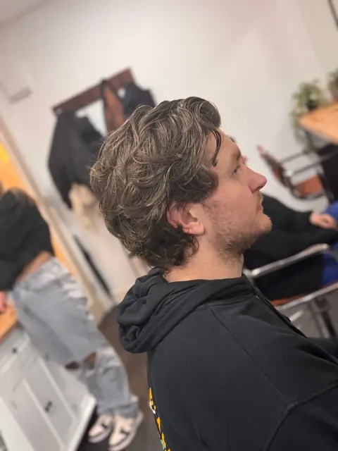 Short cut being styled in the salon