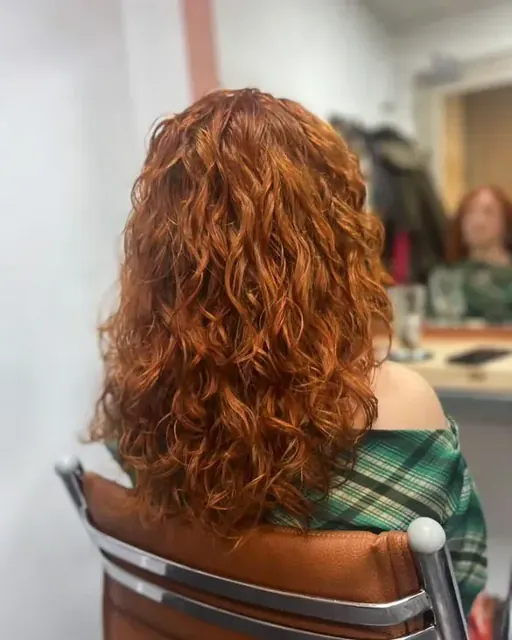 Copper curls viewed from behind