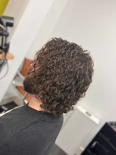 Short tight curls viewed from behind