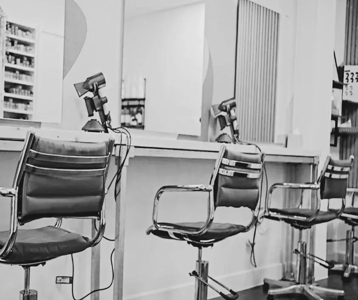 Salon chairs and mirrors in the Rupert Hayes interior